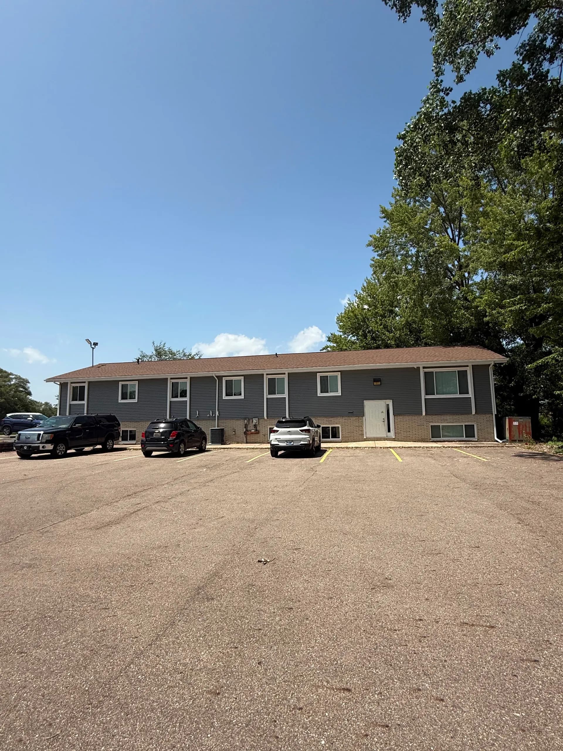 Building A with its private parking lot