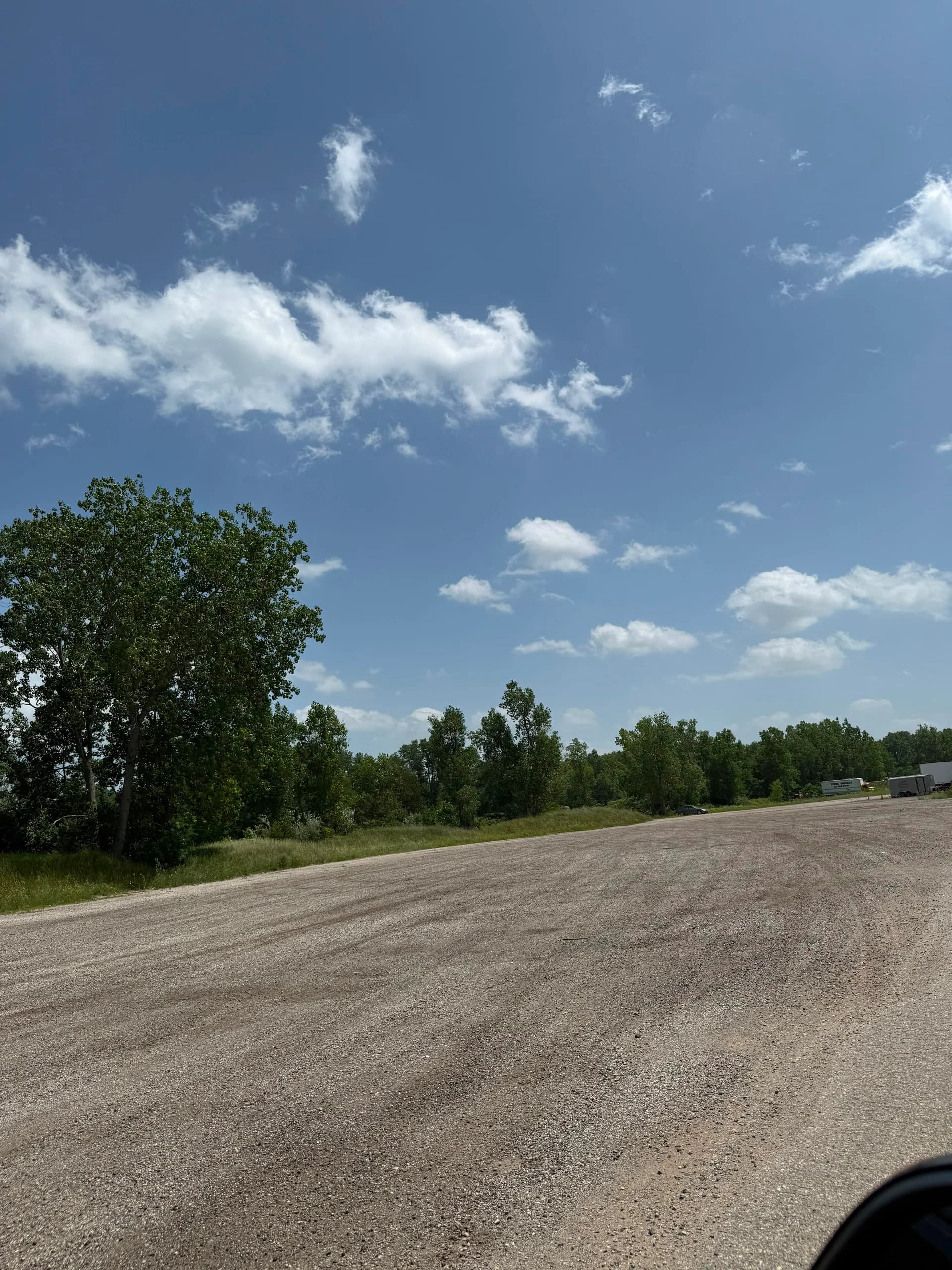 Shared parking yard at 4025 Holt Rd with room for trucks and trailers